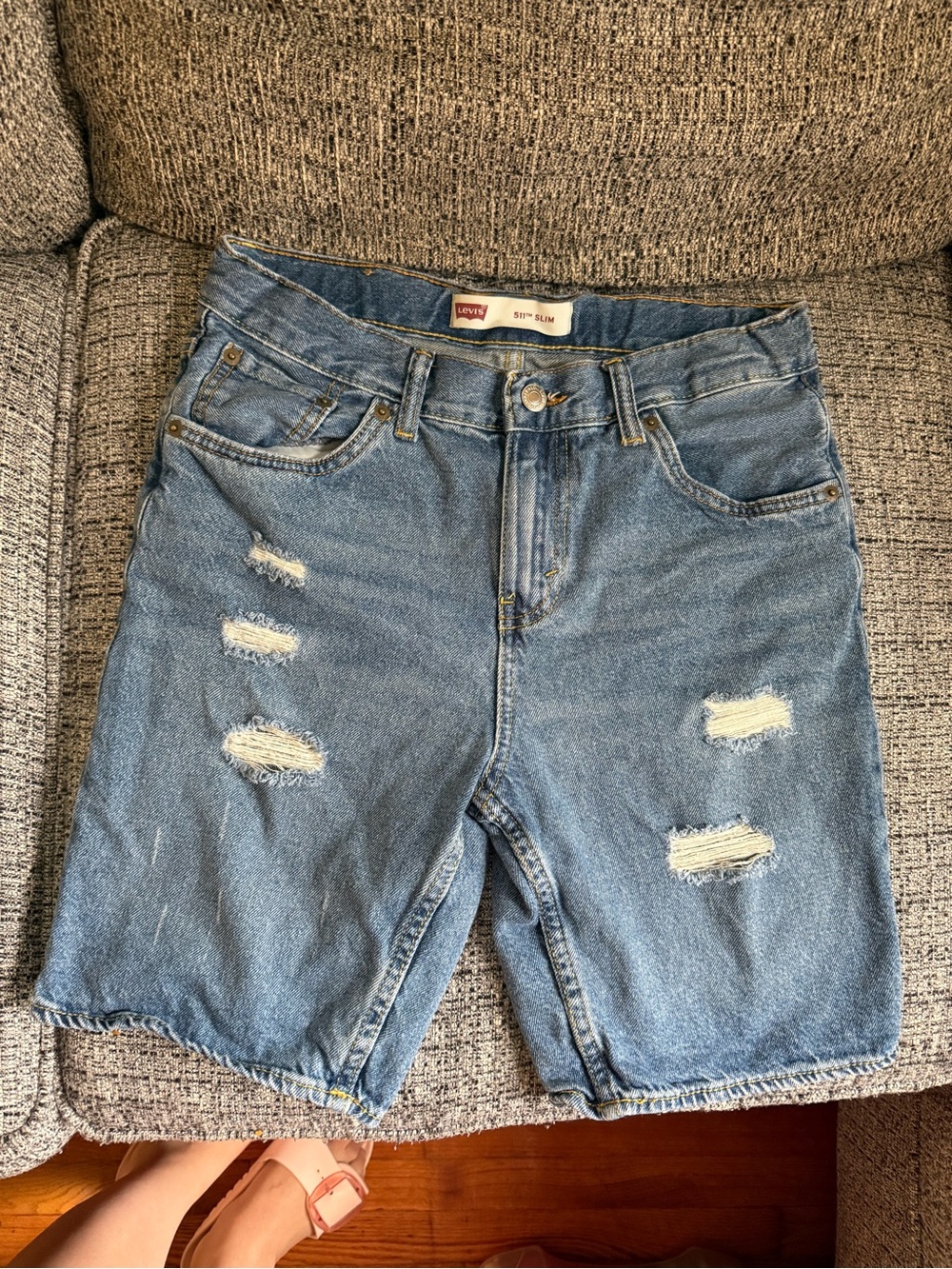 Levi's Distressed Denim Shorts in Medium Blue